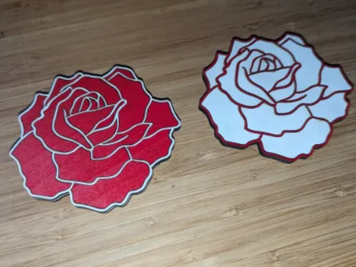 Wooden coaster with a stylized rose engraving variation
