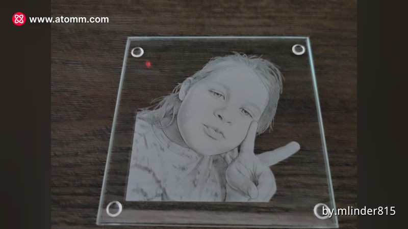 Glass coaster featuring an engraved picture design