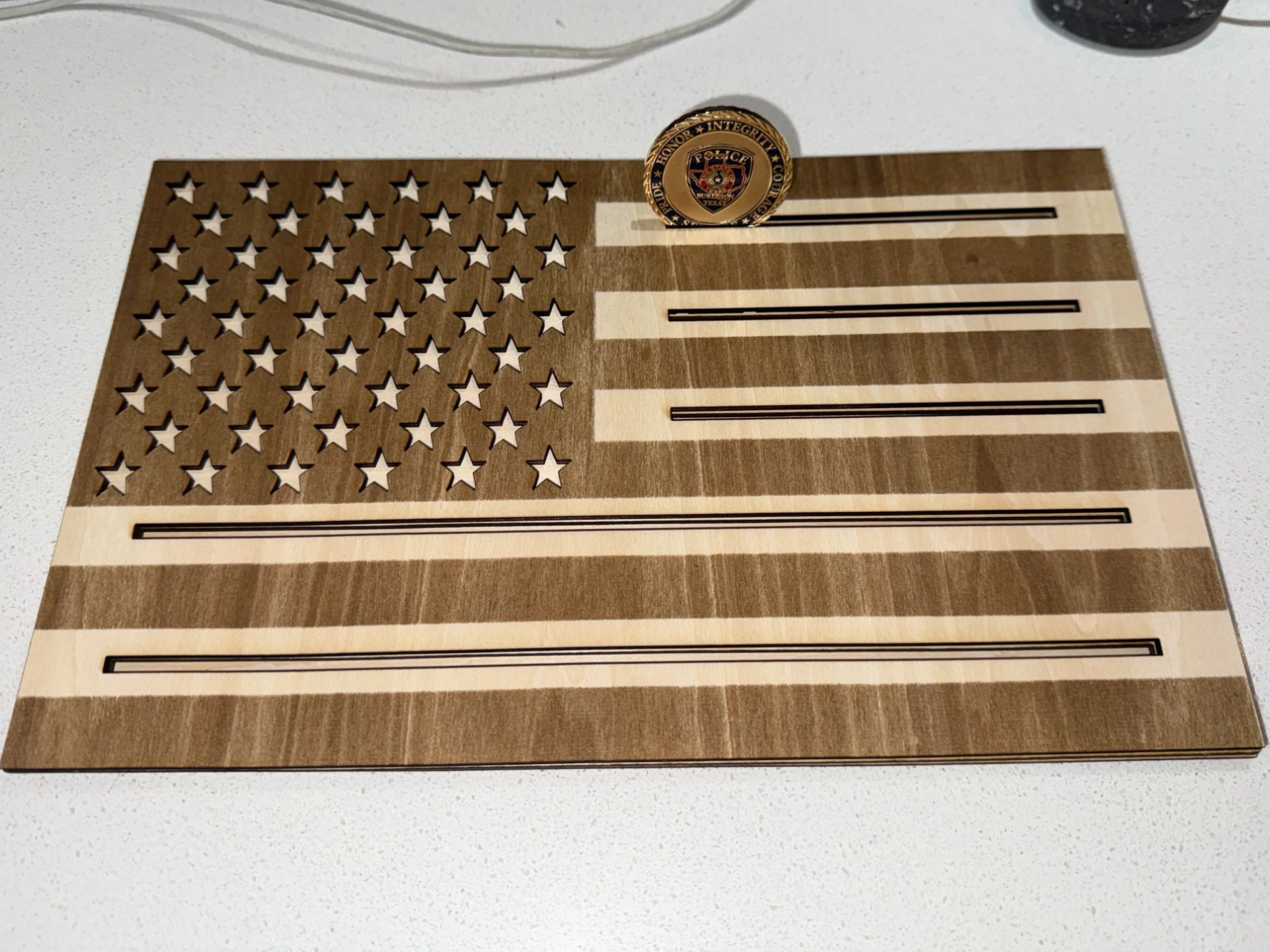 Wooden challenge coin display with American flag engraved — free patriotic laser/print project file on Atomm