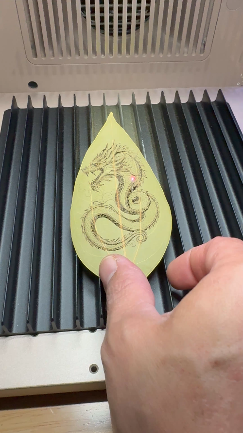 [Laser cut and engrave] Dragon Motif Leaf Art with Purple Gemstone Accent