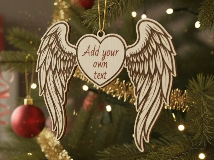 Angel wings ornament with a customizable engraved heart center