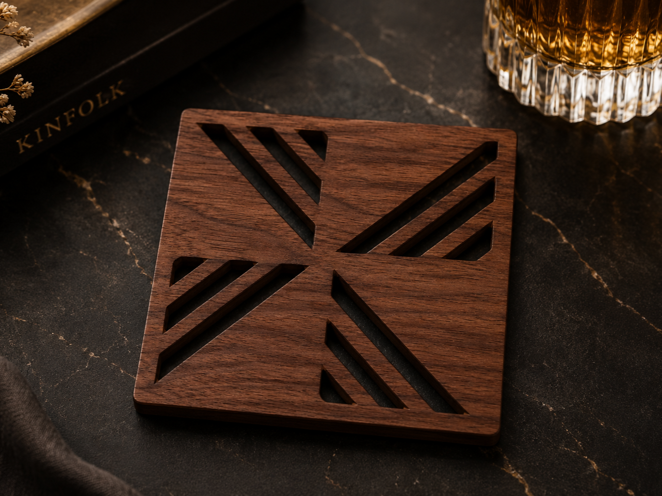 Square wooden coaster with an abstract engraved geometric pattern