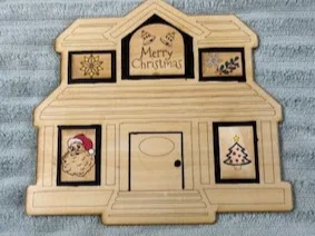 A wooden laser cut house for where you can change the decoration for various holidays or other special times of the year. — free patriotic laser/print project file on Atomm