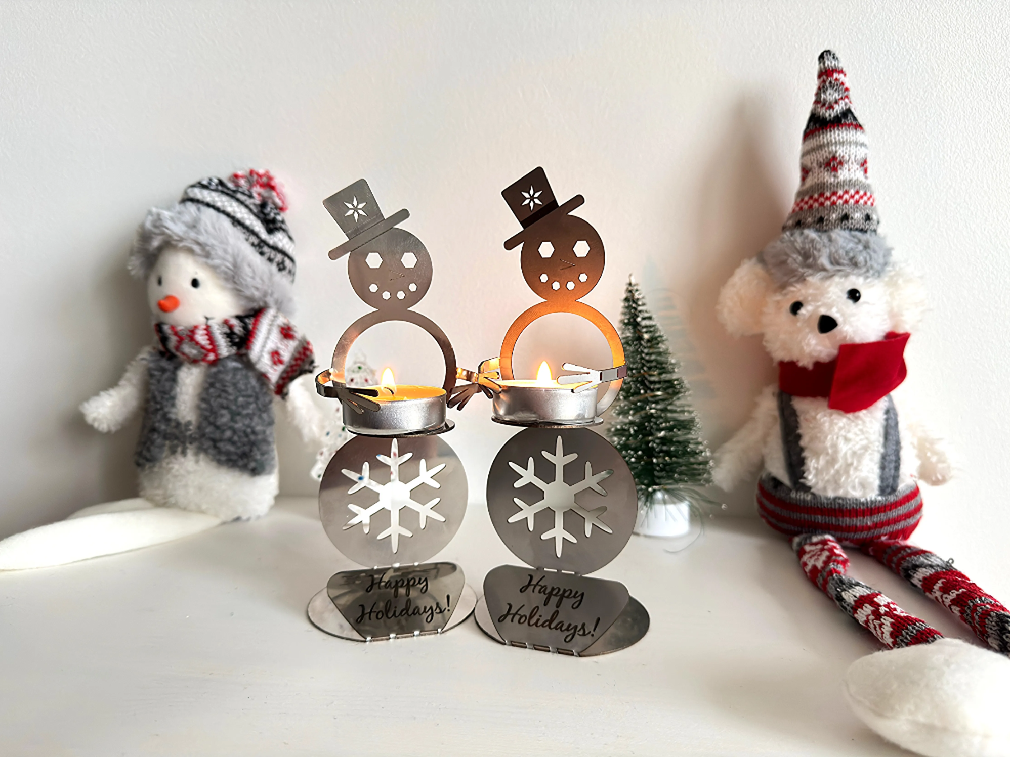 Laser cut metal snowman tea light candle holder