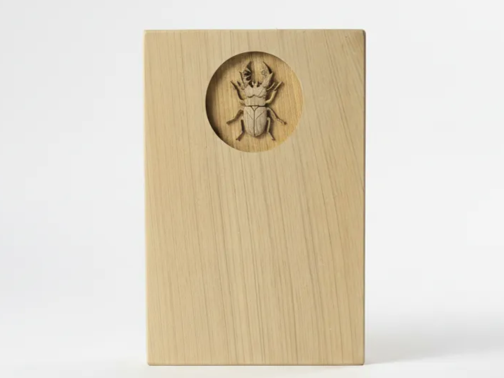 Wooden ornament with a laser-embossed stag beetle design