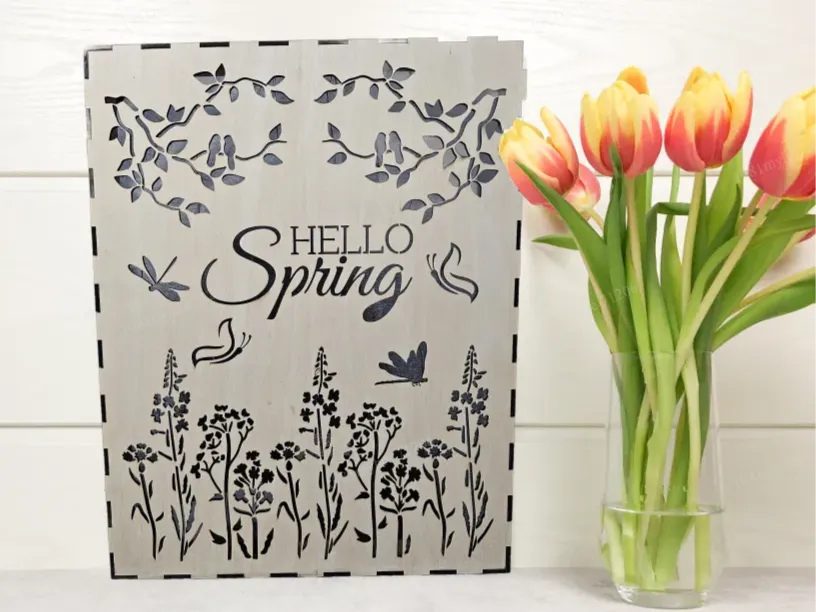 Laser cut light up Hello Spring sign glowing warmly