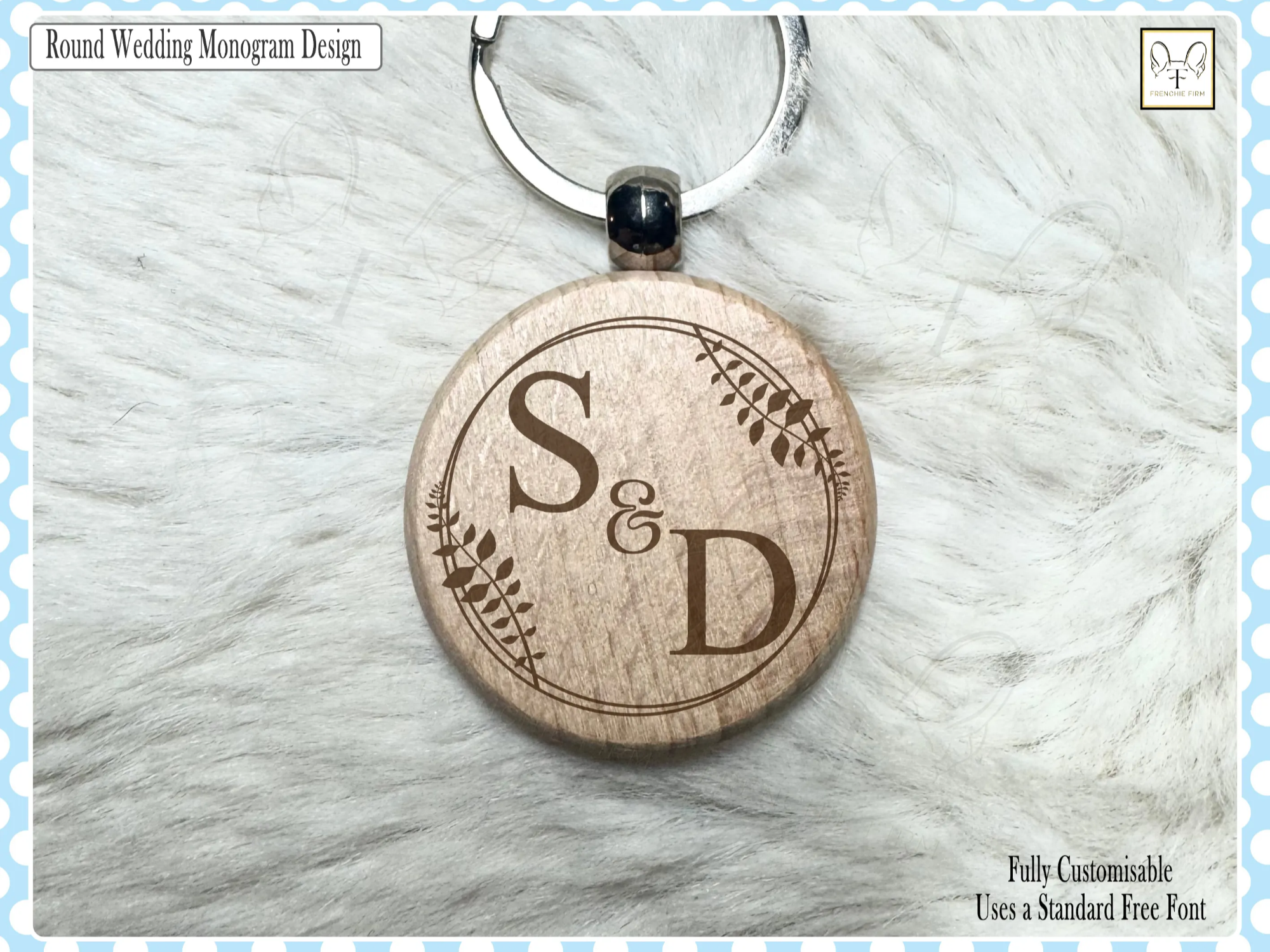 A round wooden wedding keychain with a foliage-style monogram