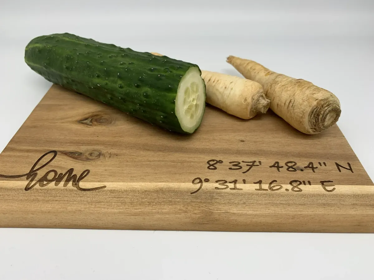 Wooden cutting board engraved with map coordinates gift idea