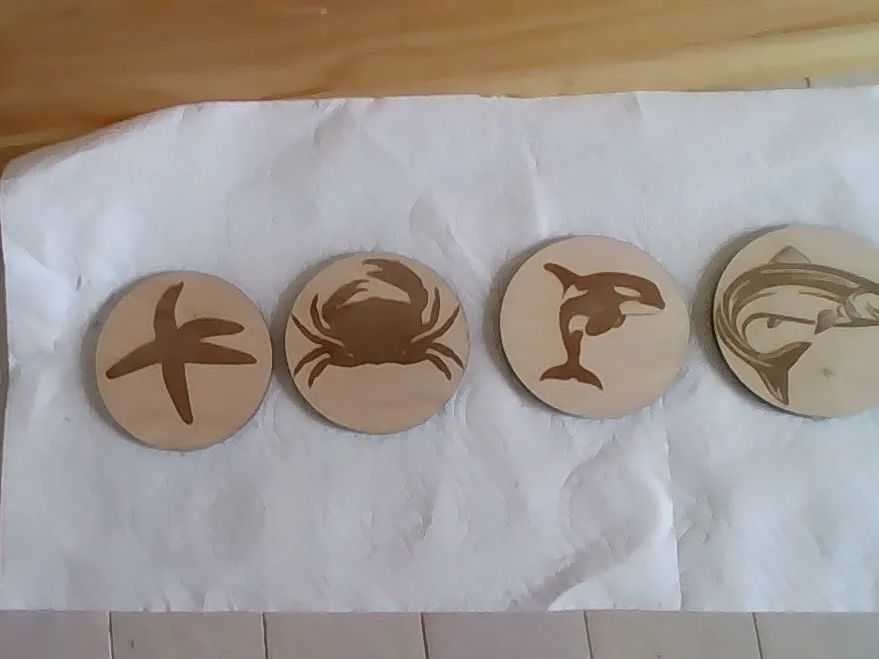 Set of wooden ocean animal coasters