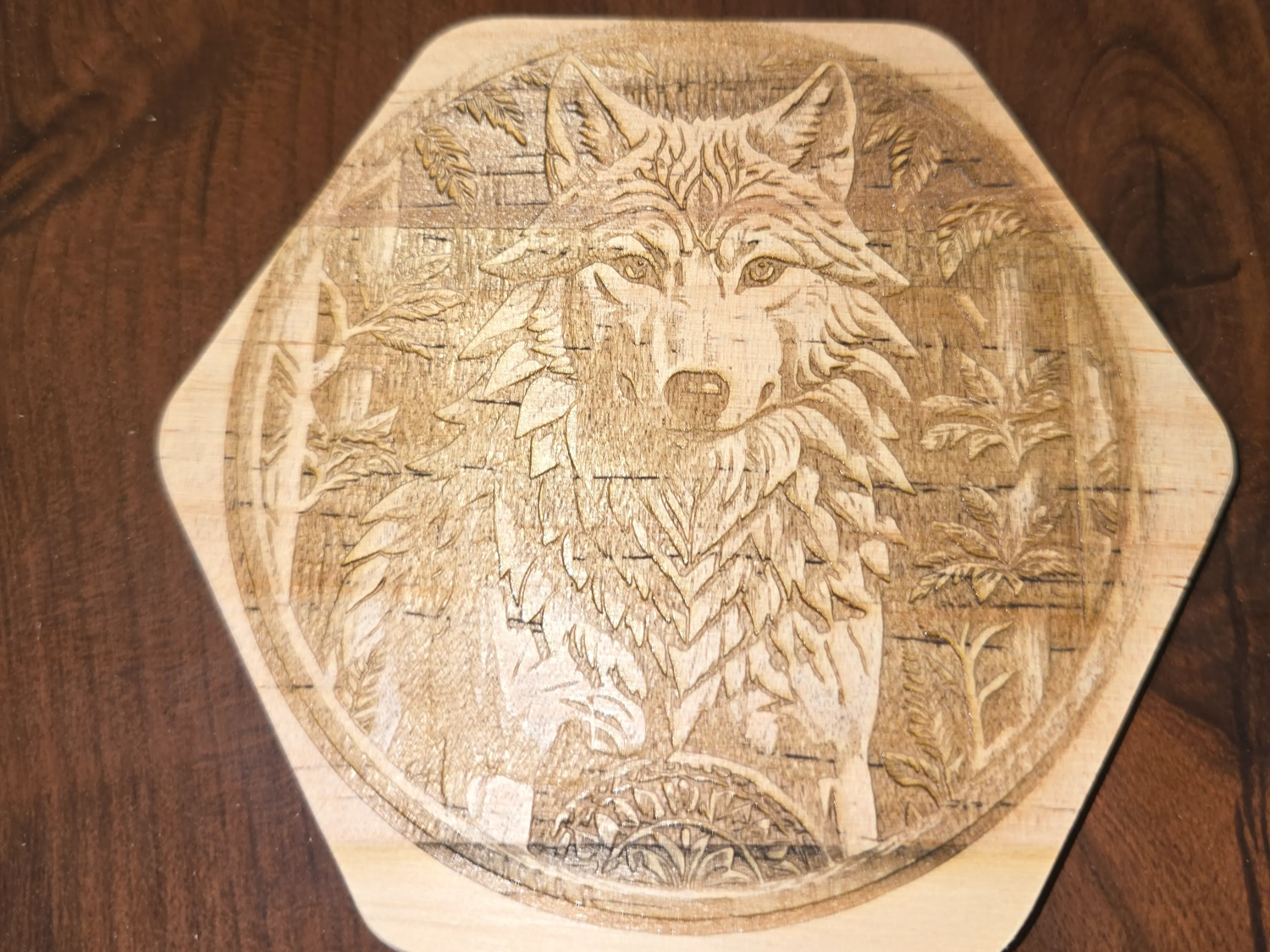 Wooden wolf coaster with forest background design