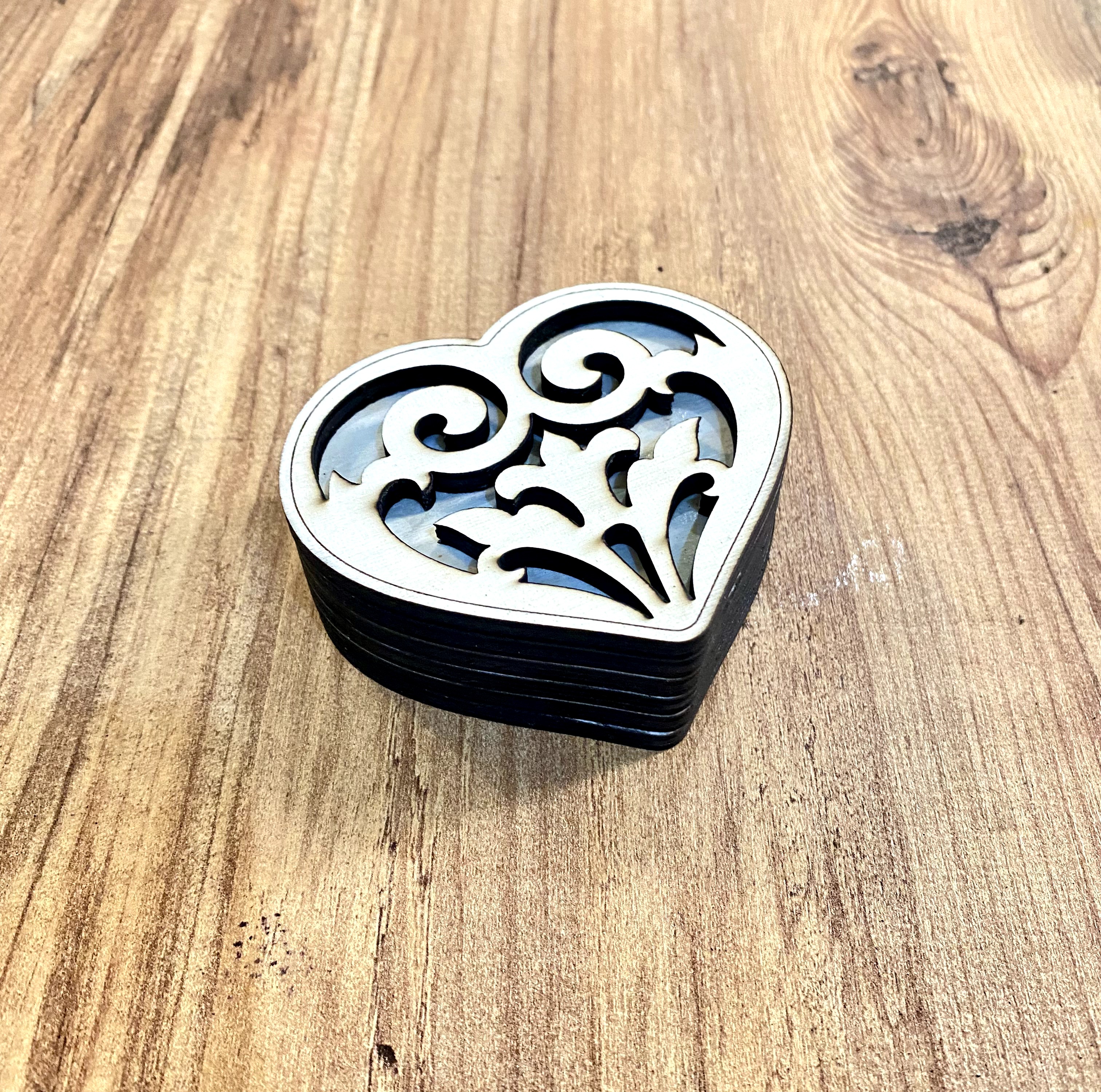 Heart-Shaped Decorative Box with Intricate Design wooden box idea