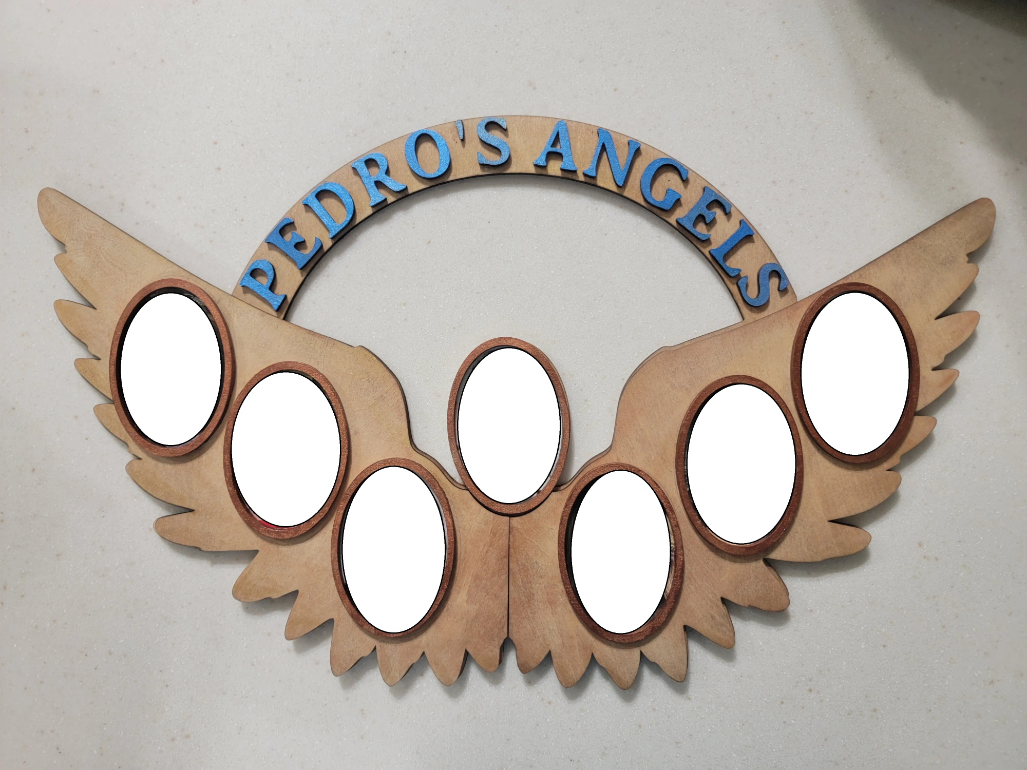 Laser-cut wooden angel wing photo frame