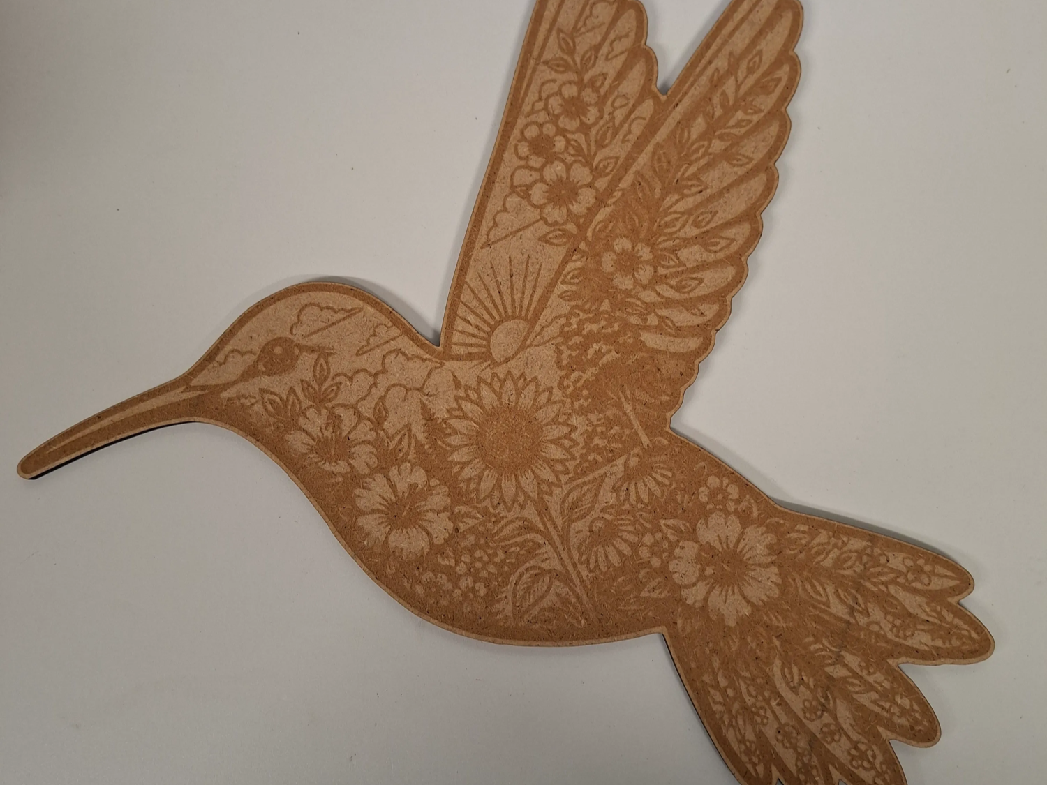 Floral hummingbird silhouette wall art