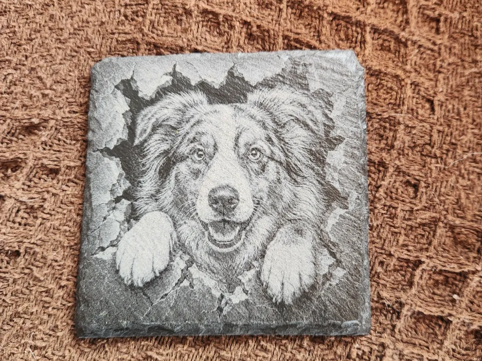 German Shepherd portrait engraved with a 3D breakthrough effect on slate coaster