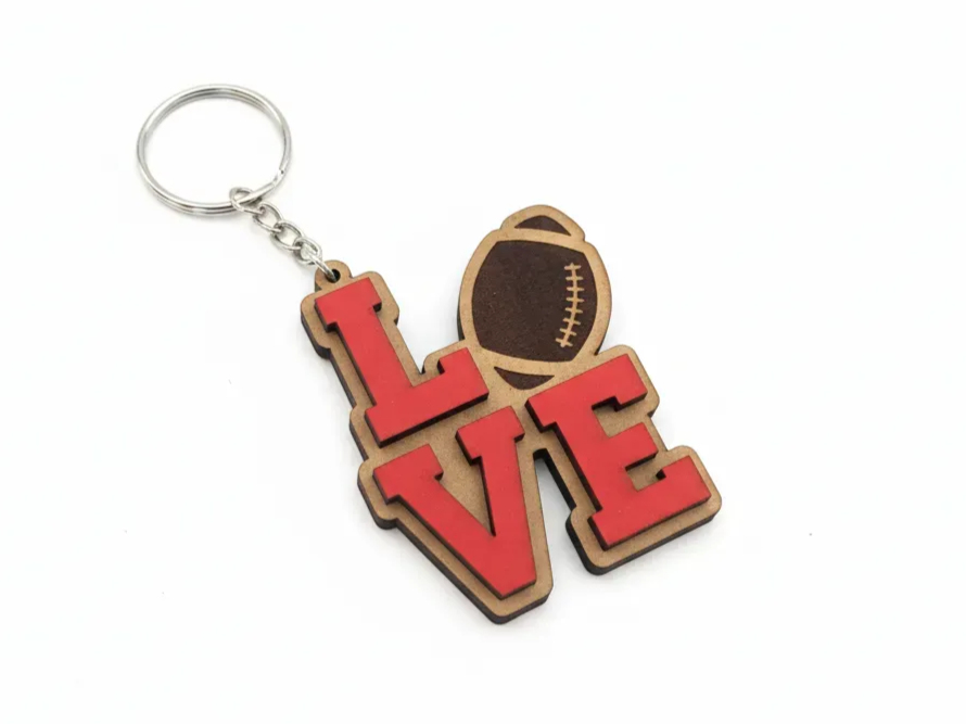 Football love keychain with red letters design