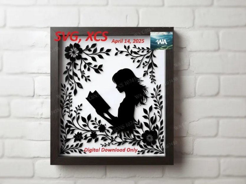 Floral silhouette art of a woman reading a book