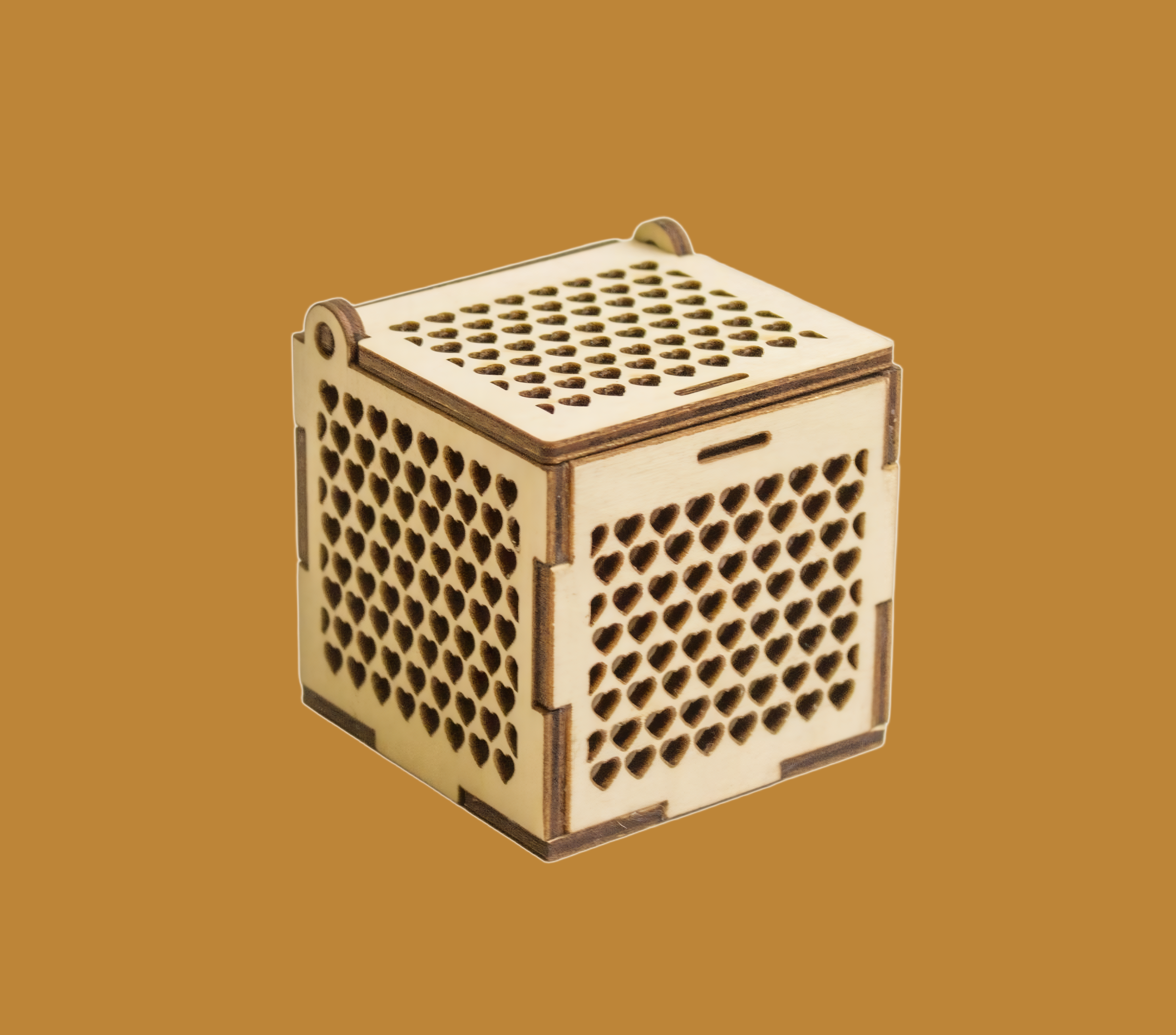 Laser-cut wooden jewelry box with heart cut-out details
