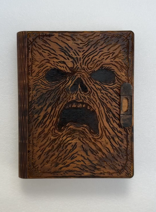 [Laser cut and engrave] Leather Bound Journal with Embossed Screaming Face Design
