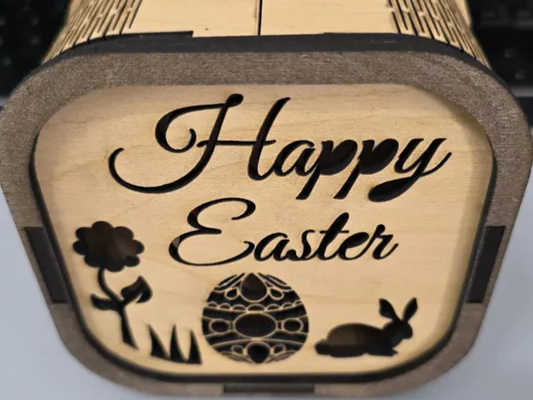 Wooden swappable light box with an Easter front panel glowing