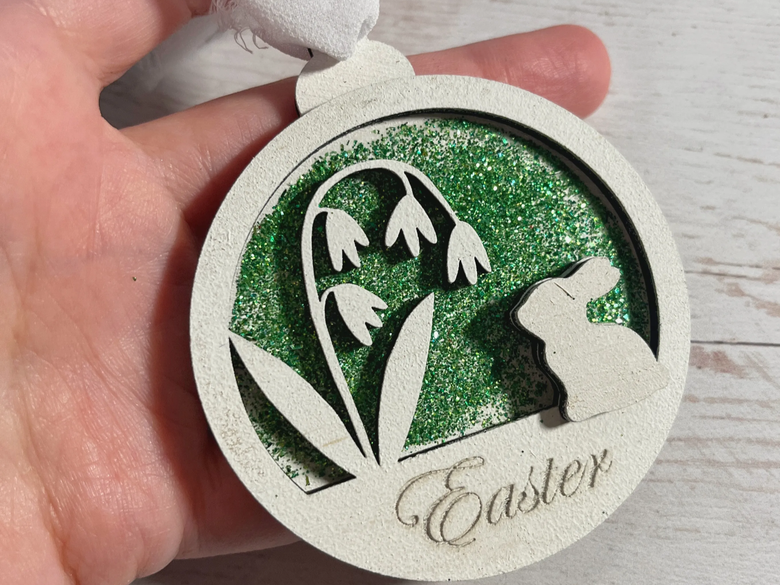 Three-layer Easter ornament with bunny and flowers