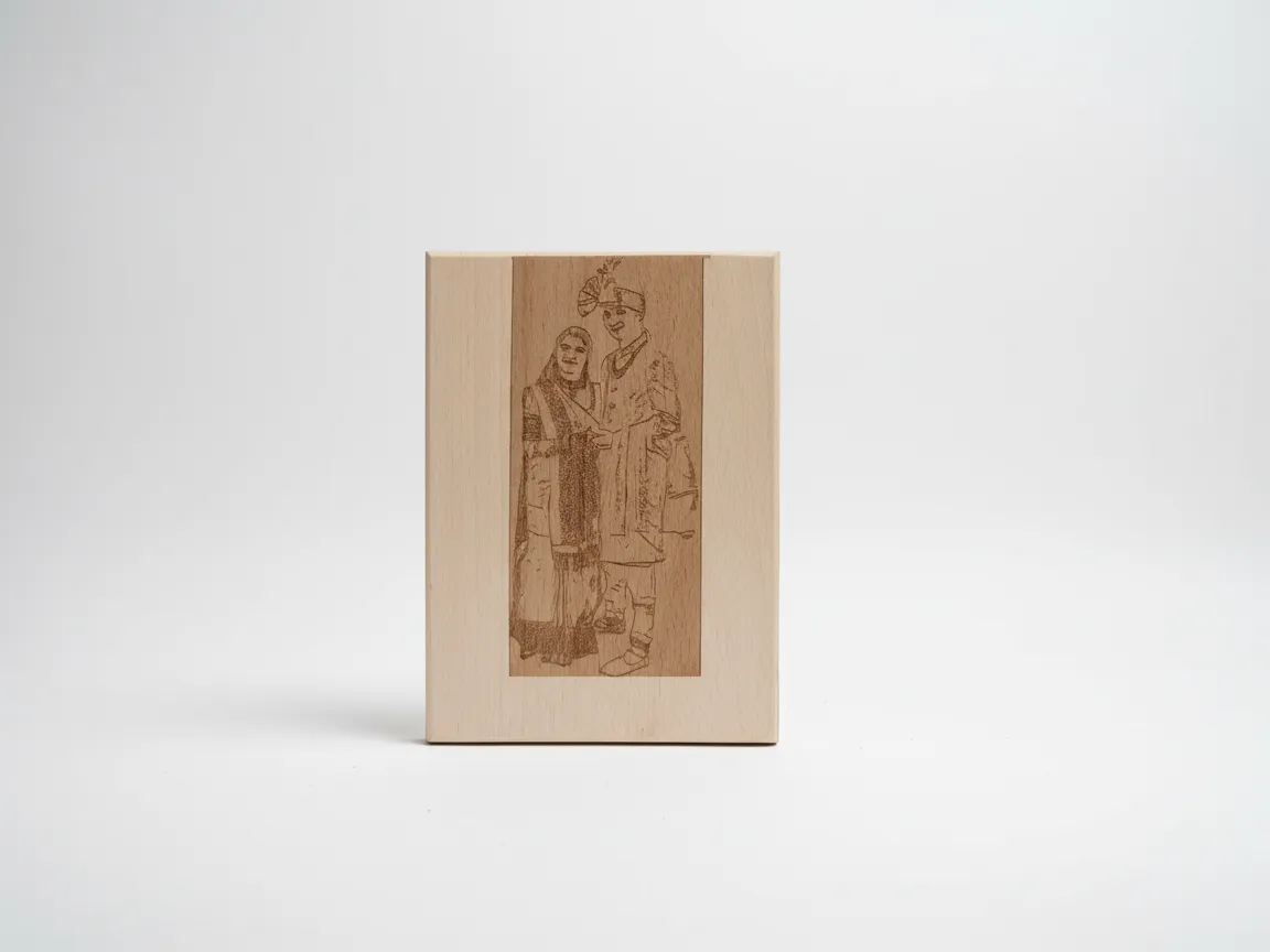 Wooden wall plaque laser engraved with a couple's photo in traditional attire