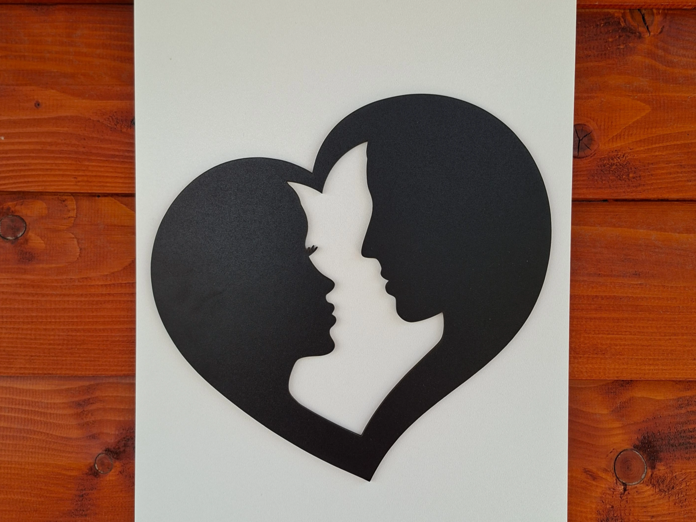 Heart with couple faces silhouette wall art