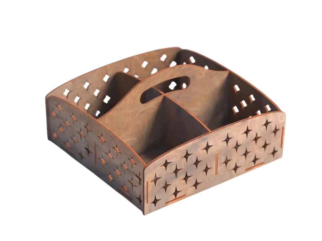 Four Compartment Serving Tray with Handle laser cut design on a table