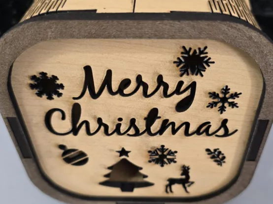 Swappable Christmas light box with interchangeable front panel