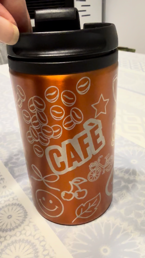 [Laser cut and engrave] Orange insulated travel mug with cafe and doodle graphics