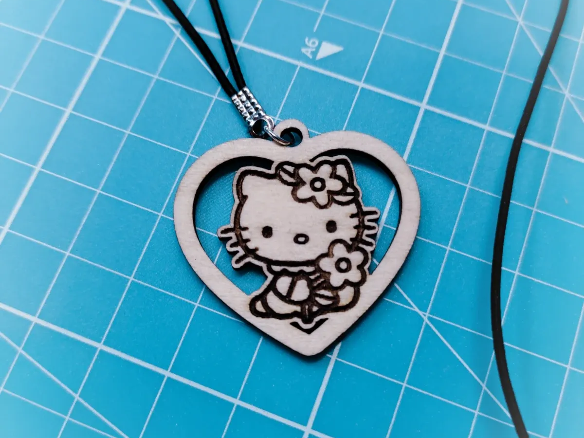 Wooden heart pendant necklace with Hello Kitty engraved holding flowers gift idea