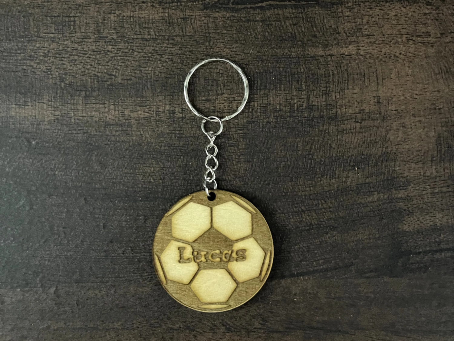 Wooden soccer ball keychain with name design