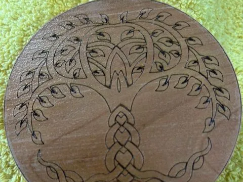 Engraved Wooden Coasters with Intricate Patterns