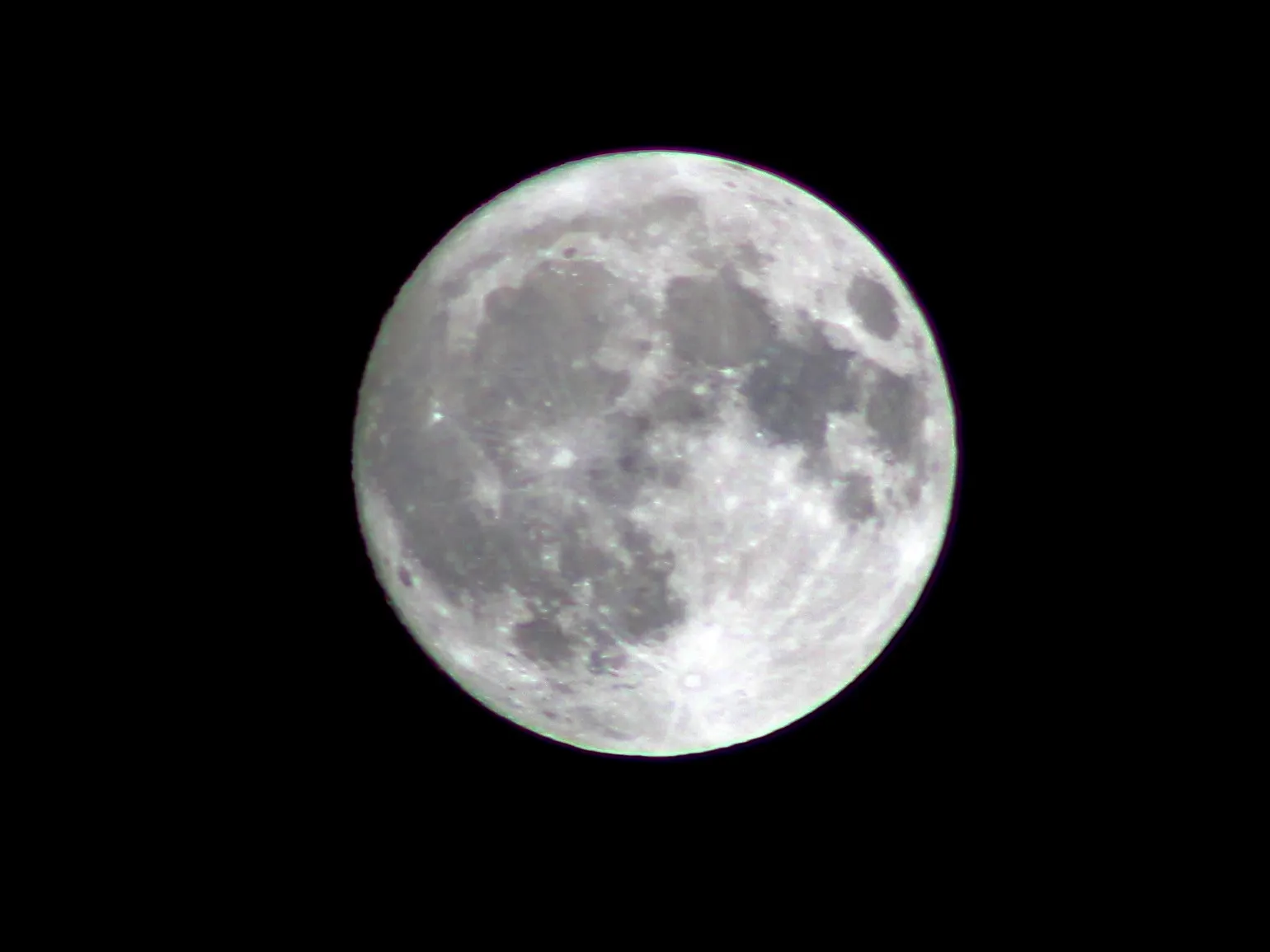Slate coaster engraved with a photo of the full moon