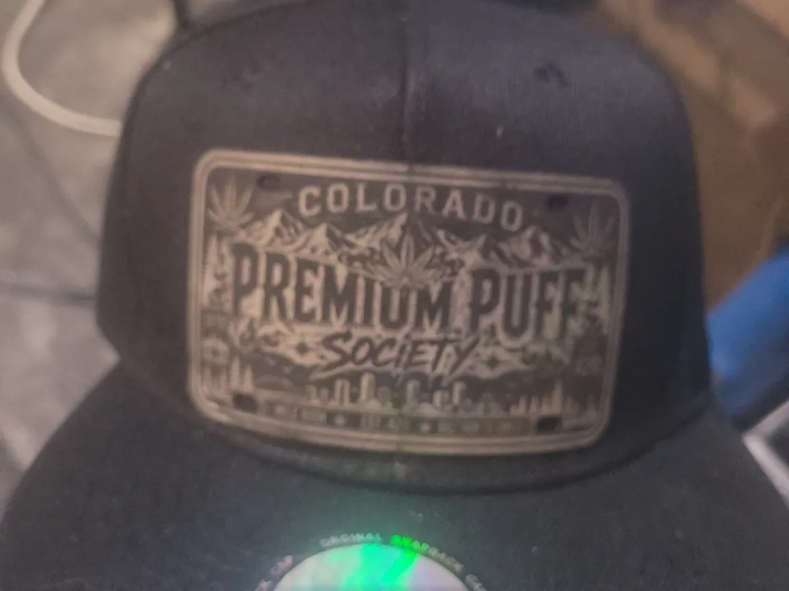 Black snapback with a Colorado logo patch