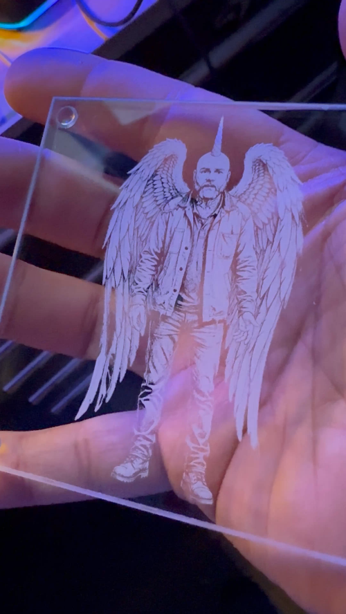 [Laser cut and engrave] Illuminated Acrylic Panel Featuring a Winged Figure with a Horn