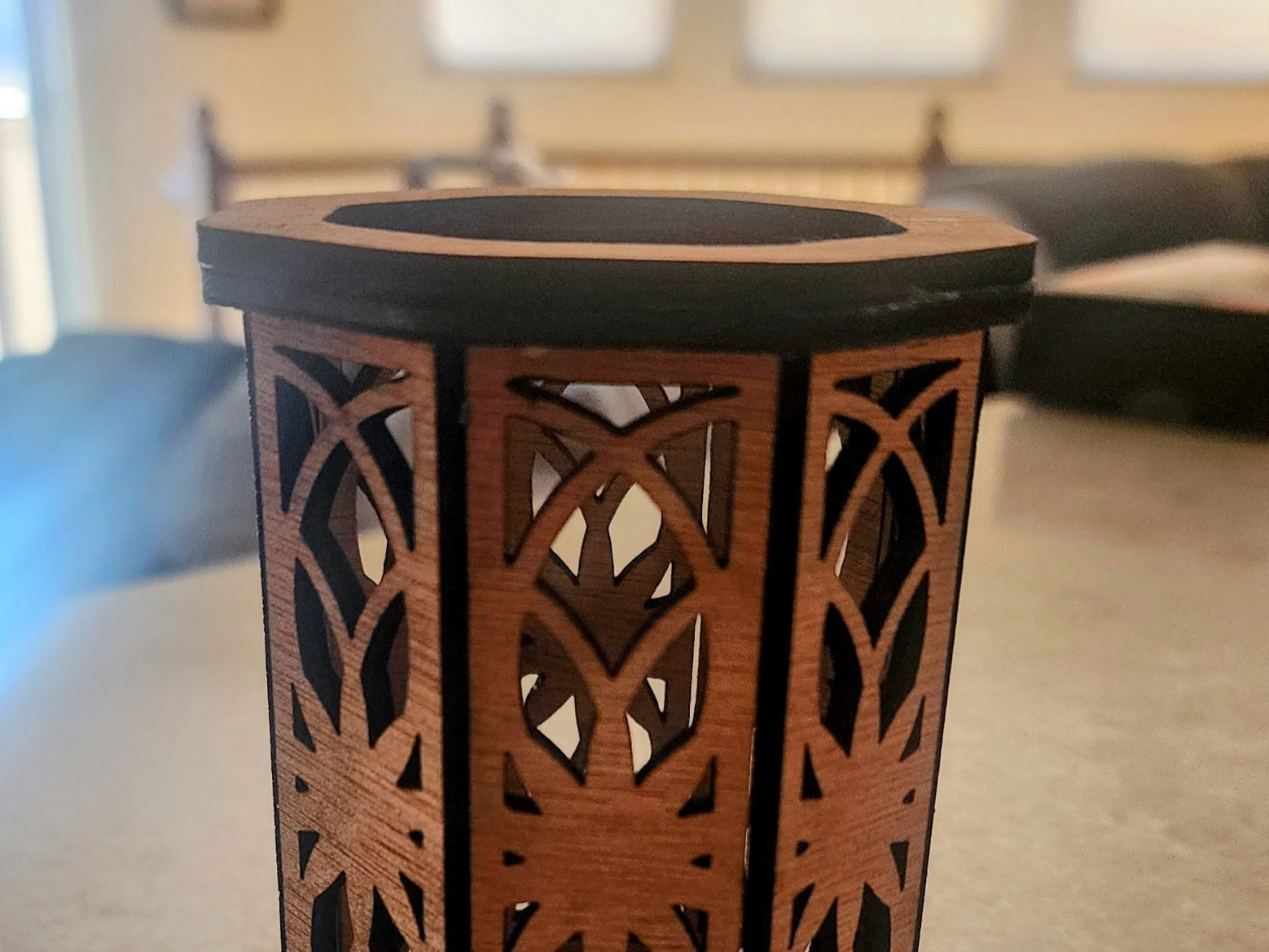 Intricate Wooden Pencil Holder with Cut-Out Patterns office desk decor idea