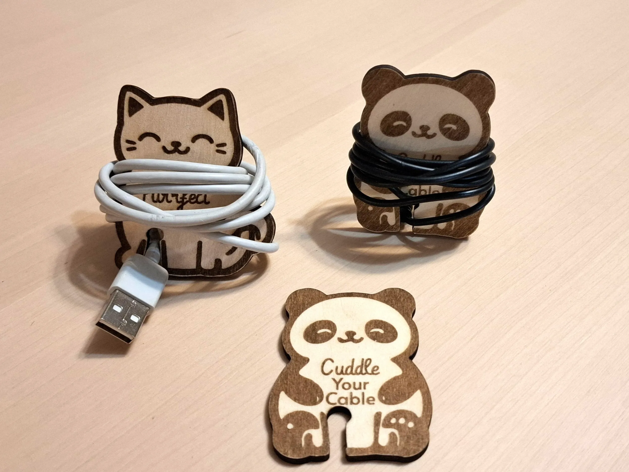 Cute wooden panda-shaped cable and earphone organizer