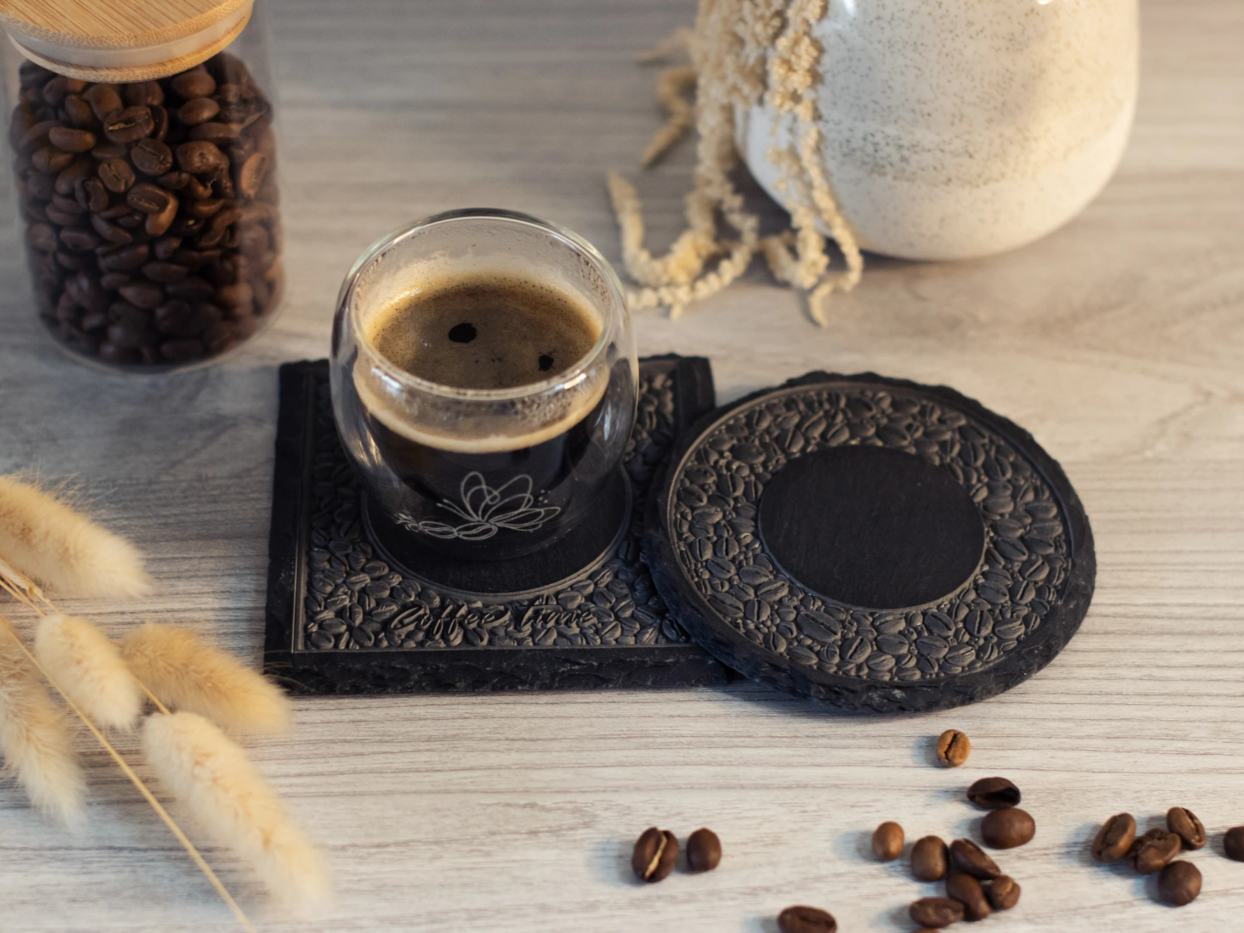 Slate coaster with embossed coffee bean pattern
