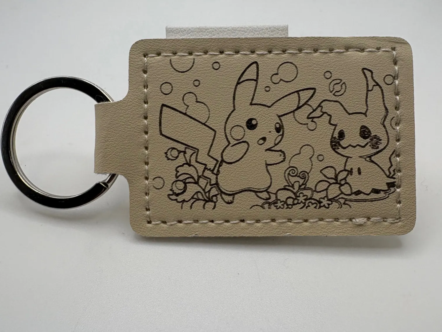 Pikachu & Mimikyu Leather Keychain pokemon keychain idea