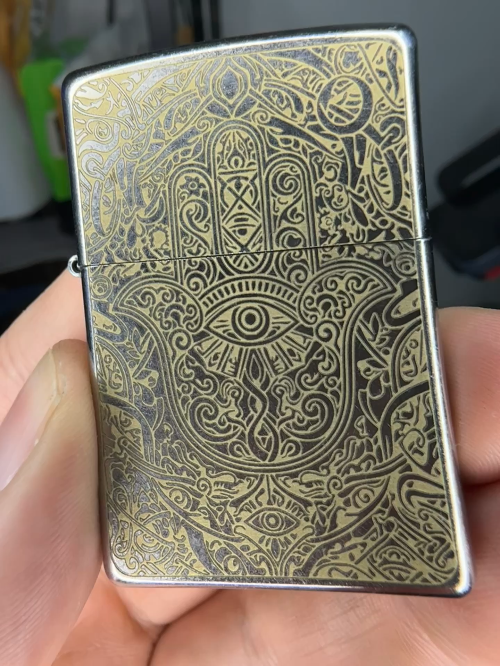 [Laser cut and engrave] Laser Engraved Metal Lighter with Intricate Hamsa Hand Design