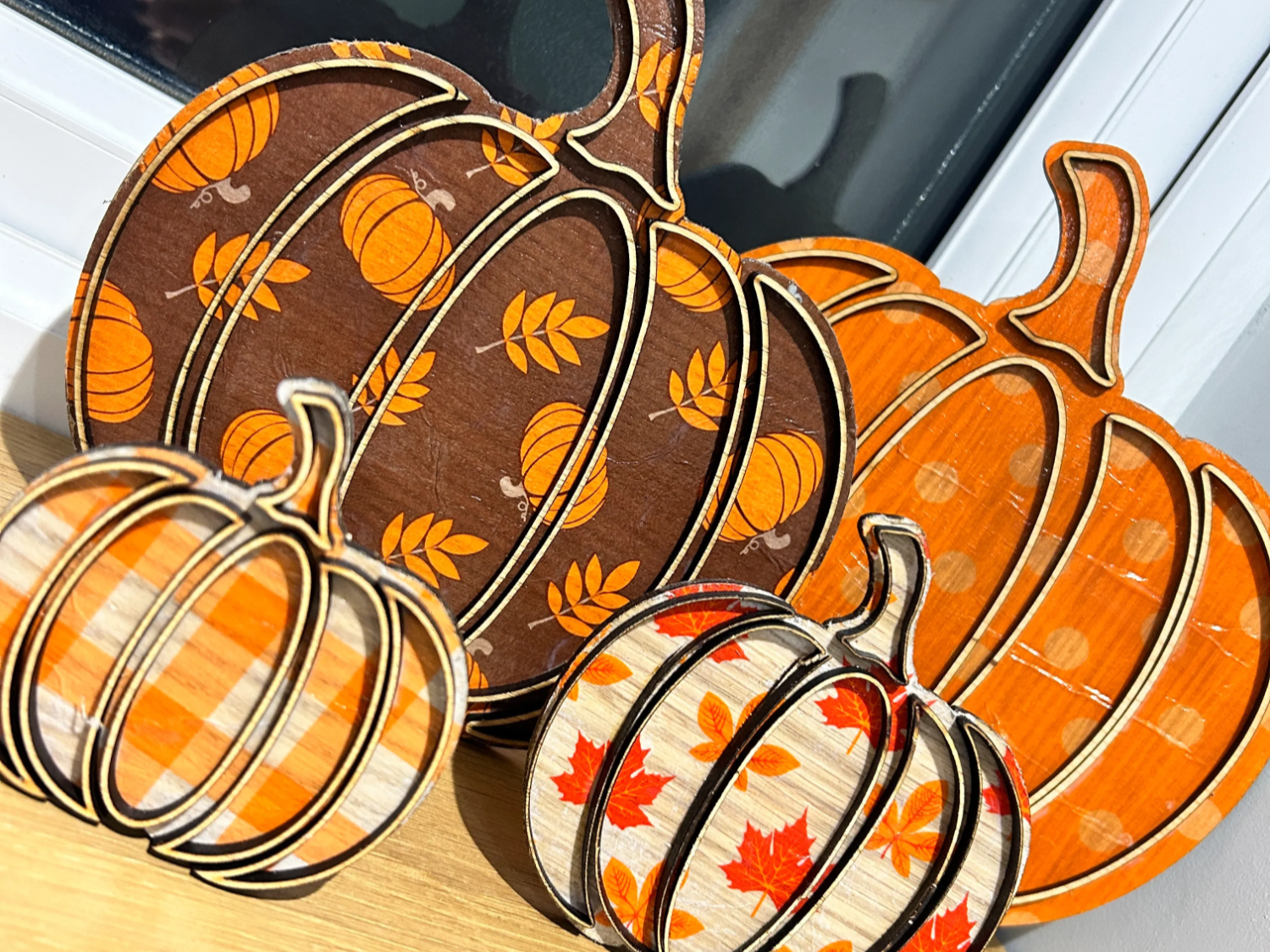 Set of laser cut pumpkin ornaments for Halloween