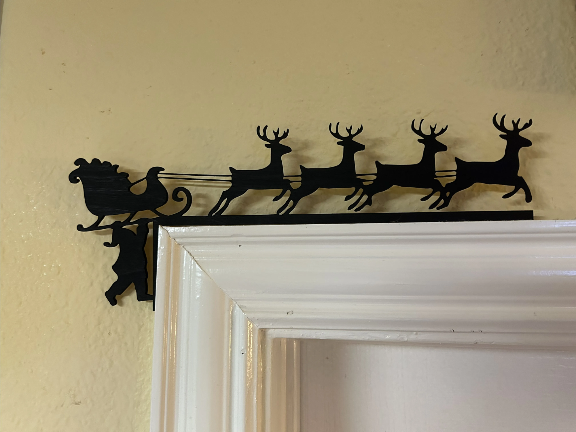 Santa in peril window corner frame Christmas decoration