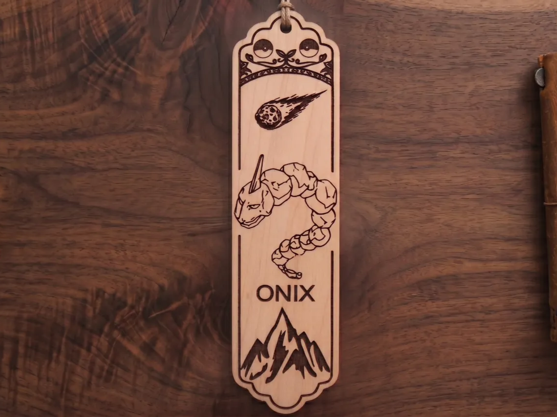 Onix Pokémon Wooden Bookmark with Meteor and Mountain Motif bookmark design