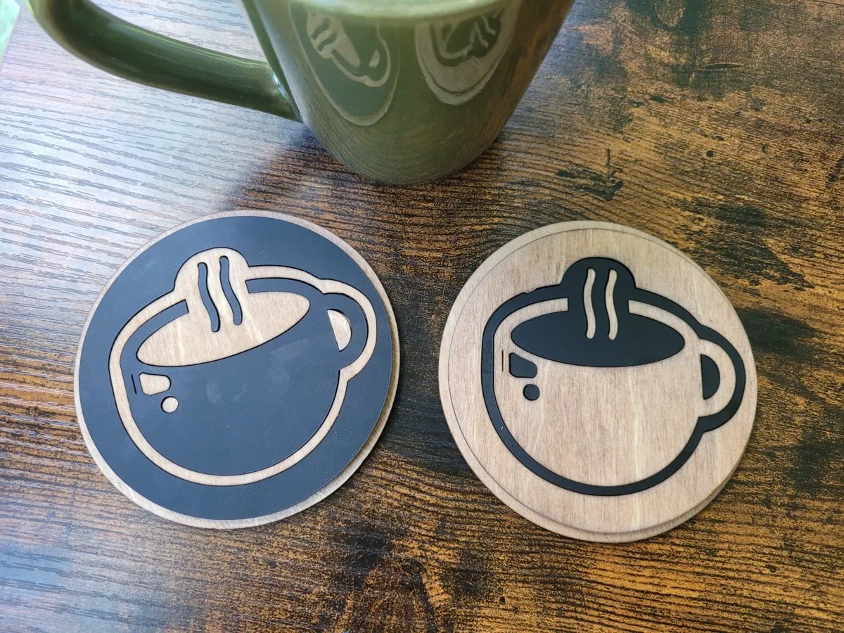 Coffee coaster with light and dark acrylic inlay design