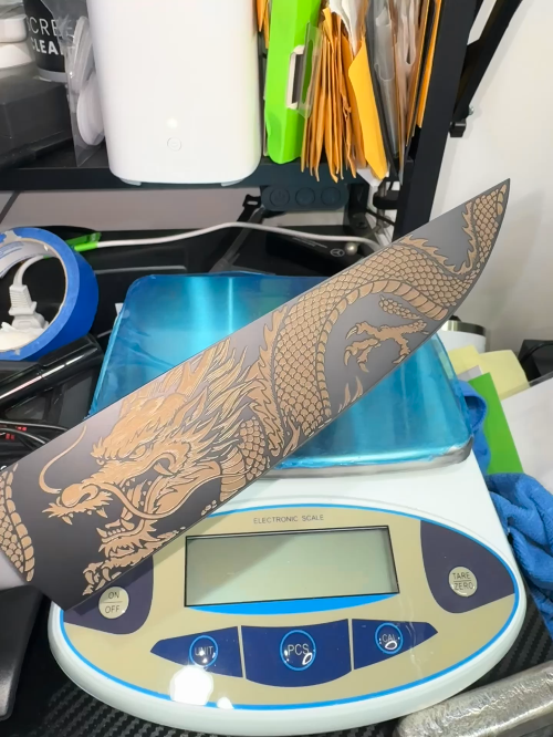 [Laser cut and engrave] Laser Engraved Dragon Design on Black Metal Plate