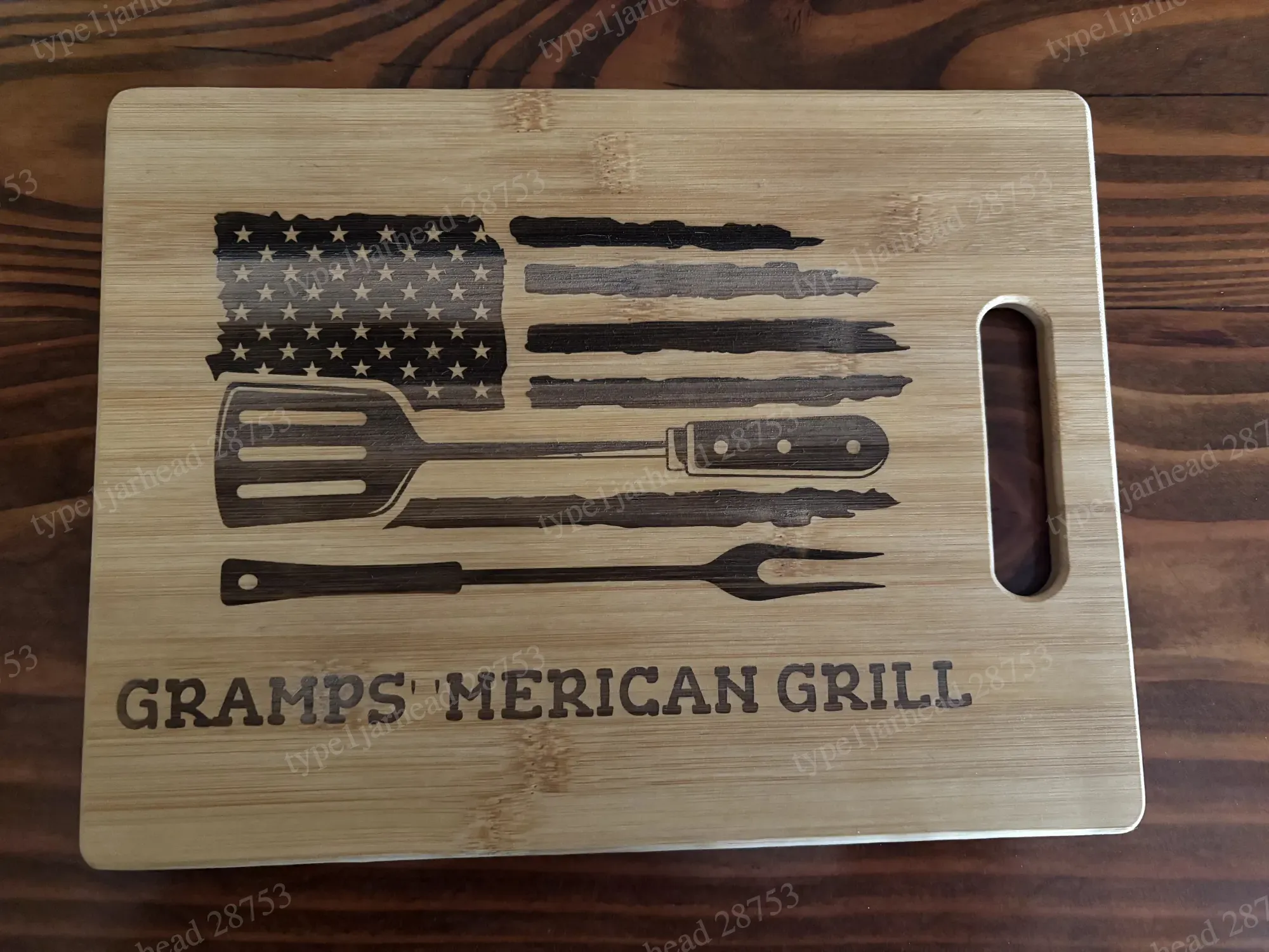 Gramps' American Grill bamboo cutting board with BBQ tools and flag design — free patriotic laser/print project file on Atomm