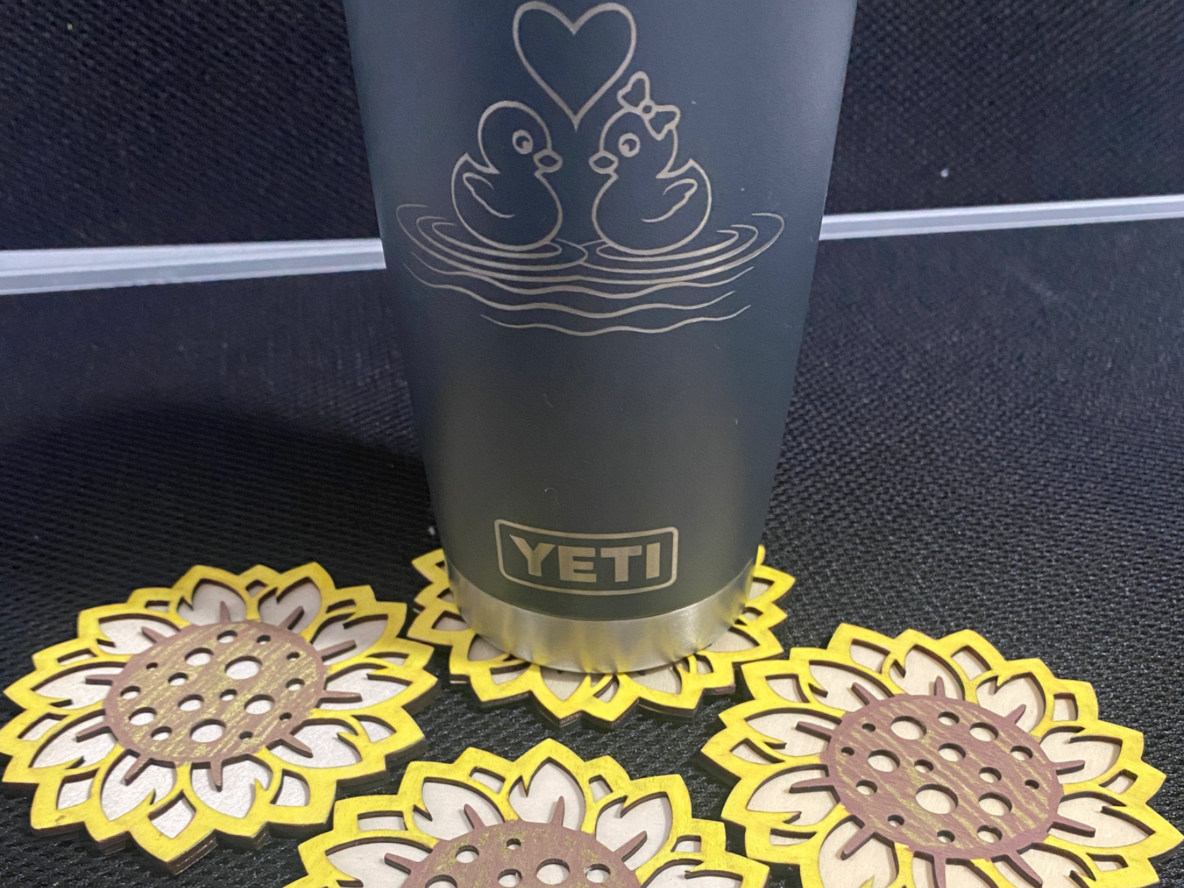 Set of laser cut flower shaped coasters