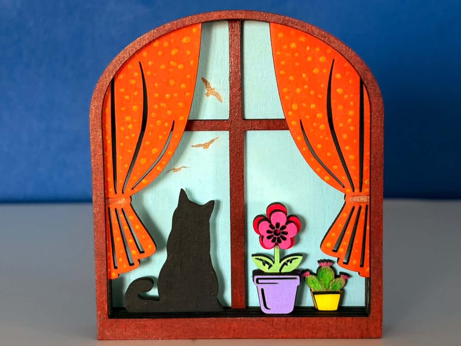 Miniature layered window shelf decor piece