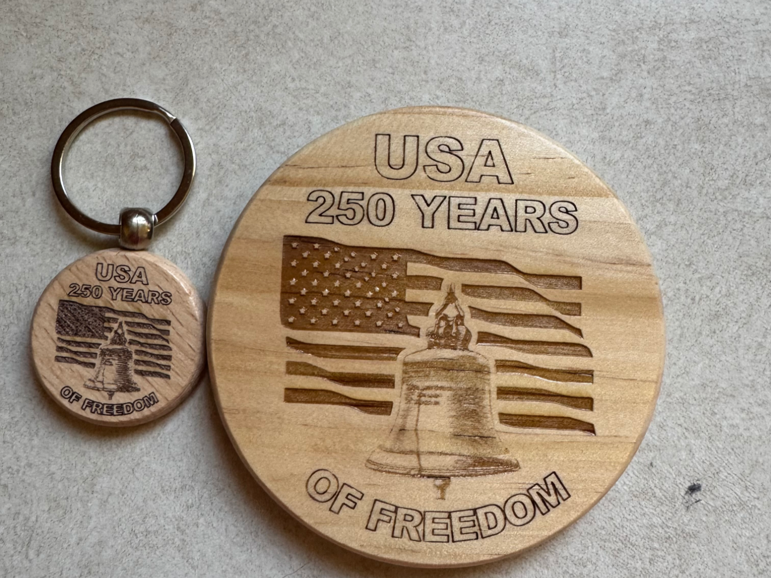 USA 250 Years of Freedom Liberty Bell and American Flag Wooden Keychain and Coaster — free patriotic laser/print project file on Atomm