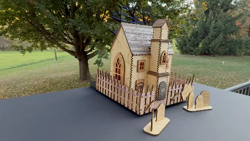 [Laser cut and engrave] Laser Cut Wooden Haunted House with Tombstones and Fence Decoration